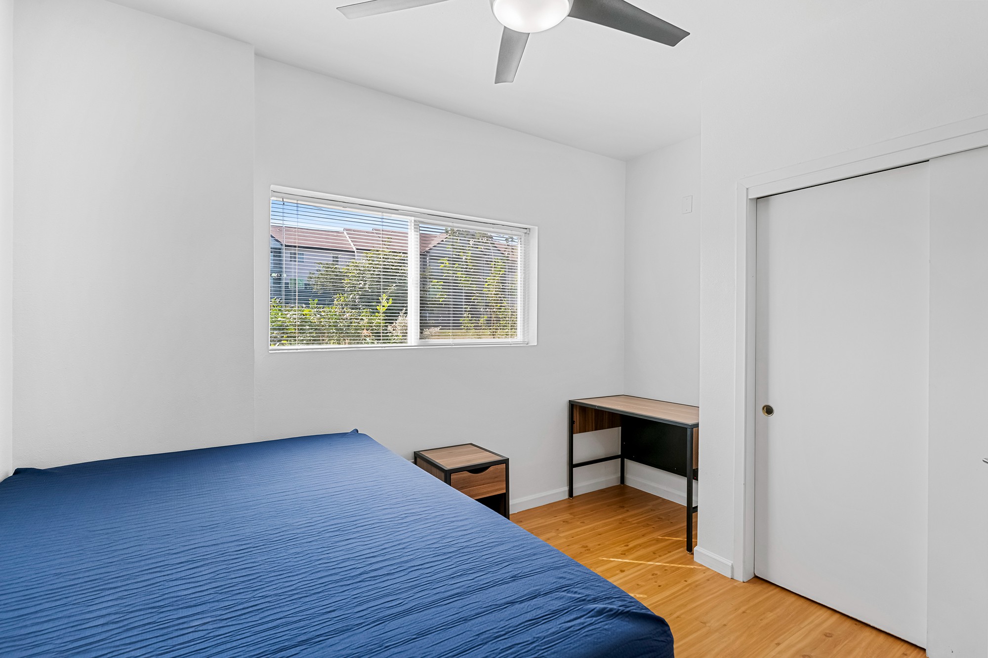 Green Spring Apartments near TXST furnished private bedrooms with hardwood style flooring