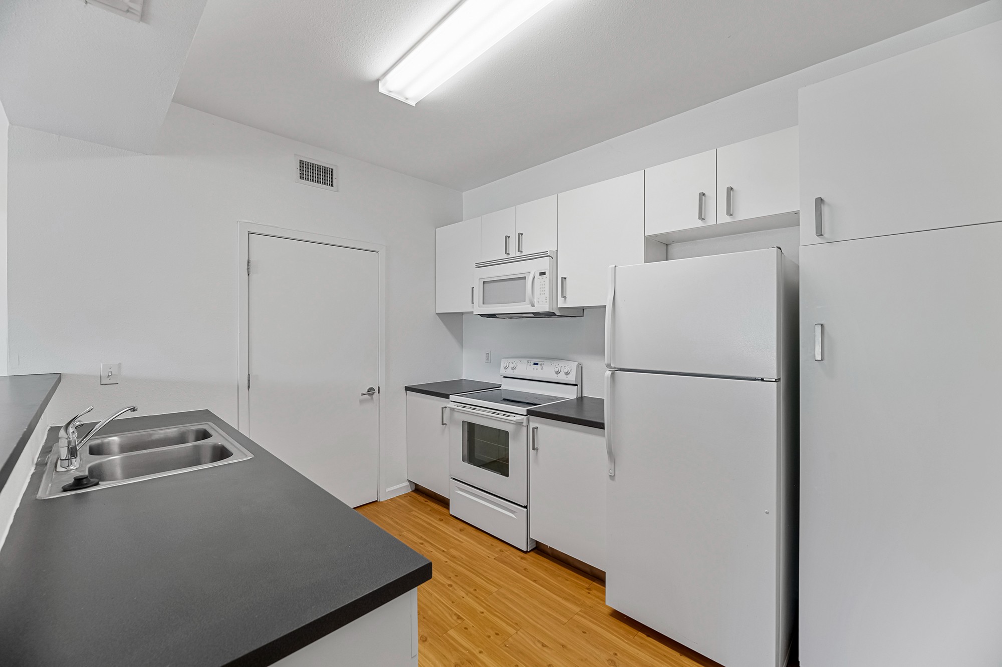 Green Spring Apartments near TXST model kitchen