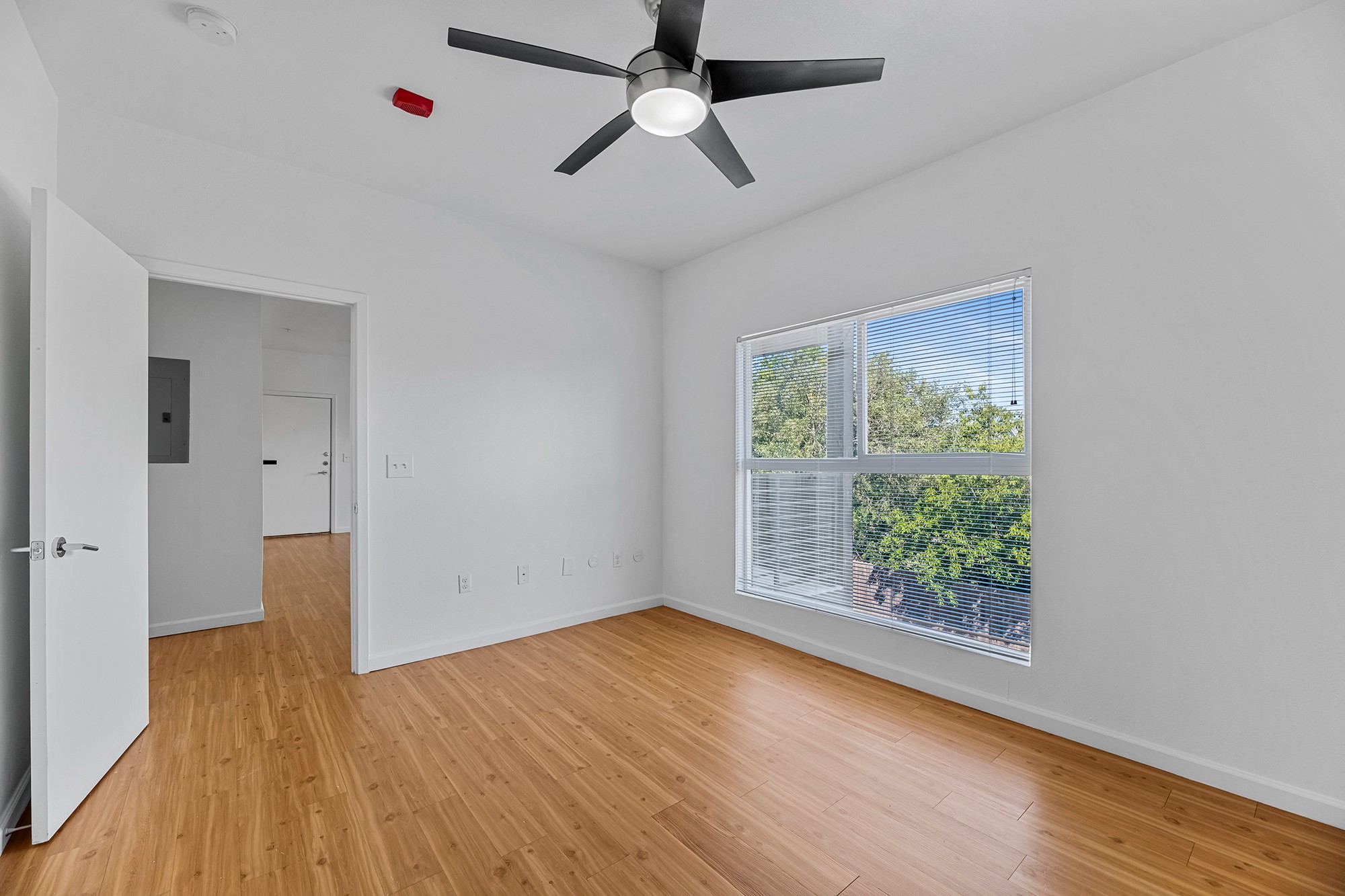 Green Spring Apartments near TXST unfurnished private bedroom with hardwood style flooring